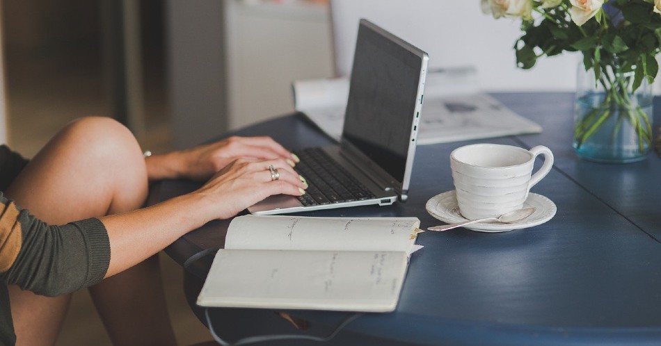 Lady working with laptop and coffee | Taking Modafinil to Study